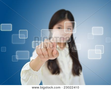 Picture or Photo of Business woman pressing on a flow of buttons