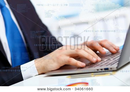 Picture or Photo of Business person working on computer against technology background