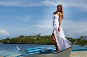 pic of outdoor  - outdoor portrait of young beautiful woman bride in wedding dress on beach - JPG 