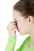 stock photo of pressure  - Young woman with sinus pressure pain  - JPG 