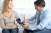 pic of bloodpressure  - Doctor measuring blood pressure - JPG 