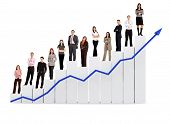 picture of shareholders  - group of business people with a chart representing growth and success  - JPG 
