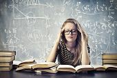 image of study  - Beautiful blonde girl stressed by the study - JPG 