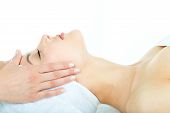 picture of facial  - Beautiful woman is getting a facial massage in the spa salon - JPG 