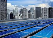 stock photo of construction  - solar panels on the roof of modern skyscraper - JPG 