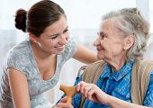 picture of home  - Senior woman with her doctor or caregiver - JPG 