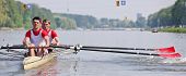 picture of sculling  - Oarsmen building up speed during a rowing race - JPG 