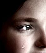 foto of drip  - Closeup of girl crying with tear rolling down her cheek - JPG 