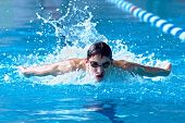 picture of competition  - Swimmer in waterpool swim one of swimming style - JPG 