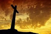 pic of religion  - cross silhouette with the sunset as background - JPG 