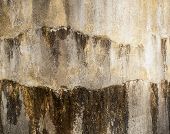 picture of seep  - Concrete wall of a water tank with water seeping out as background texture - JPG 