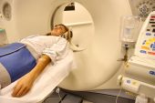 stock photo of scan  - portrait of patient entering in a medical scan - JPG 