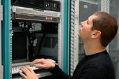 stock photo of isp  - Network Technician administrator Perform Preventive Maintenance To A Server
 - JPG 