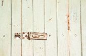 stock photo of latch  - Old house door and old latch with padlock on doors - JPG 