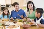picture of family  - Children Dinner Eating Family Lunch Parents 10 Year Old 30s 6 Year Old Boy Brother Color Colour Daughter Dining Room Domestic Elementary Age Father Food Four People Girl Happy Hispanic Home Horizontal Image Indoors Mexican Food Man Mid Adult Mother Pre - JPG 