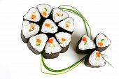 stock photo of over white  - rolls served over white with green stems - JPG 