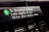 foto of bridge  - Public New York City subway sign pointing to the Brooklyn Bridge - JPG 