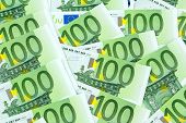 image of investment  - many einhhundert euro banknotes lie side by side - JPG 