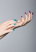 picture of trend  - blue and pink trend manicure on acrylic nails of a young Caucasian woman - JPG 