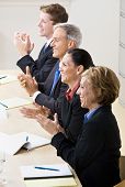 foto of business people  - Business people clapping in meeting - JPG 