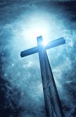 foto of religion  - wooden cross on dark sky - JPG 