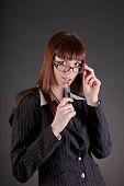 pic of business people  - Thoughtful business woman wearing glasses - JPG 