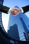 picture of teamwork  - Businessman teamwork partners shaking hands with suit - JPG 