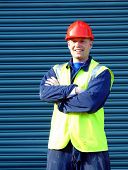 image of construction worker  - construction worker with folded arms - JPG 