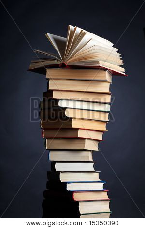 Picture or Photo of Pile of books on a black background