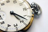 picture of watch  - close up of antique pocket watch over white background - JPG 