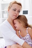 picture of mother  - Mother comforting her crying child - JPG 