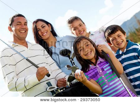 Picture or Photo of Portrait of a beautiful happy family playing golf