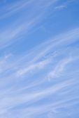 stock photo of blue sky  - Clouds in a clear blue sky scene - JPG 