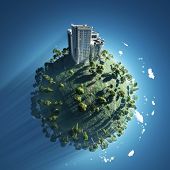 stock photo of globe  - building on green planet - JPG 