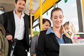 foto of business people  - Passengers in a bus  - JPG 