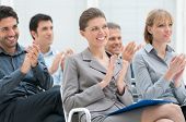 image of meeting  - Happy business group of people clapping hands during a meeting conference - JPG 