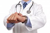 picture of watch  - Doctor looking at watch checking the time concept for appointment or deadline - JPG 