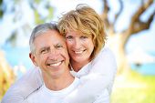 image of smile  - Mature couple smiling and embracing - JPG 