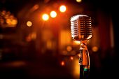 stock photo of restaurant  - Retro microphone on stage in restaurant - JPG 