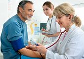 image of pressure  - Patient is being observed by doctor  - JPG 