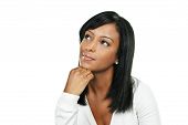 image of woman  - Thoughtful black woman looking up portrait isolated on white background - JPG 