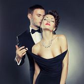 stock photo of  photo  - Fashion photo of sexy elegant couple in the tender passion - JPG 