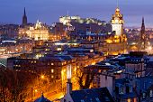 stock photo of buildings  - Edinburgh Skylines building and castle from Calton Hill at dusk Scotland UK - JPG 