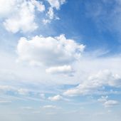 pic of blue sky  - white fluffy clouds in the blue sky - JPG 