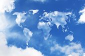 stock photo of blue sky  - world map shaped clouds in the sky - JPG 