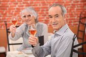 foto of restaurant  - Older couple in a restaurant - JPG 