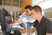 picture of group  - Teacher and student working on computer - JPG 