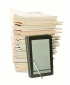 pic of newspaper  - Electronic book with a stack of old newspapers behind on white background - JPG 