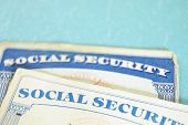 foto of security  - closeup of US Social Security cards on blue - JPG 