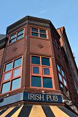 pic of restaurant  - Old building with a sign on front that reads Irish Pub - JPG 